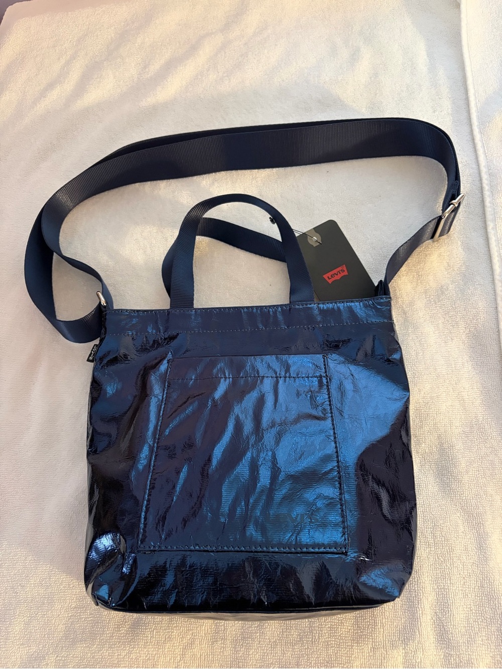 Levi’s Mini Icon Tote Bag-Navy Patent Finish
New with Tag